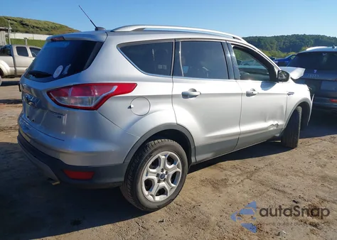 2014 Ford Escape Titanium z USA, uszkodzony, nr VIN 1FMCU9J92EUC05477